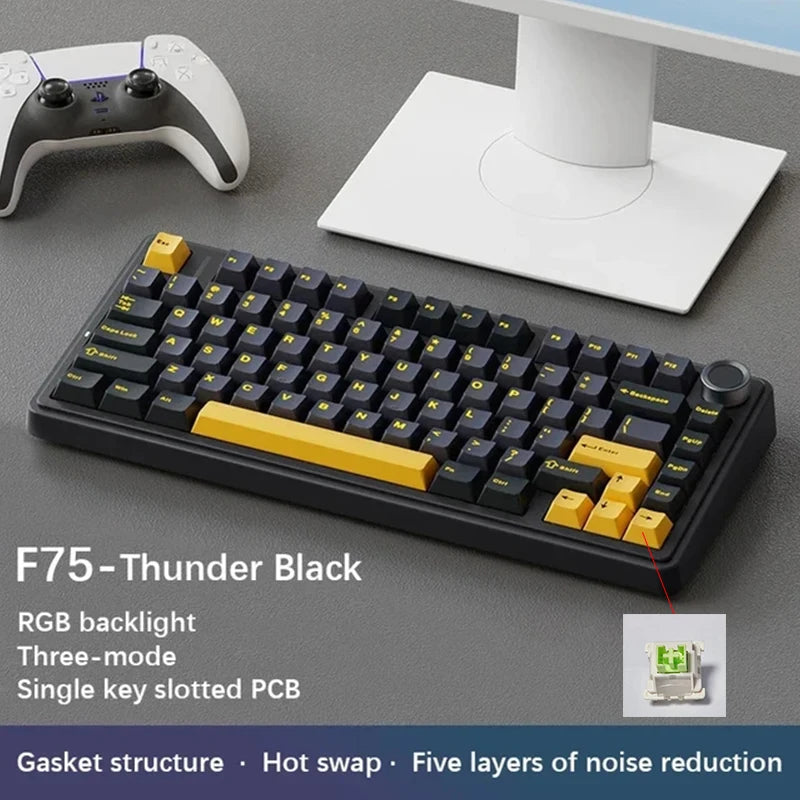 Mechanical keyboard with RGB backlighting on a desk setup with a monitor and gaming controller.