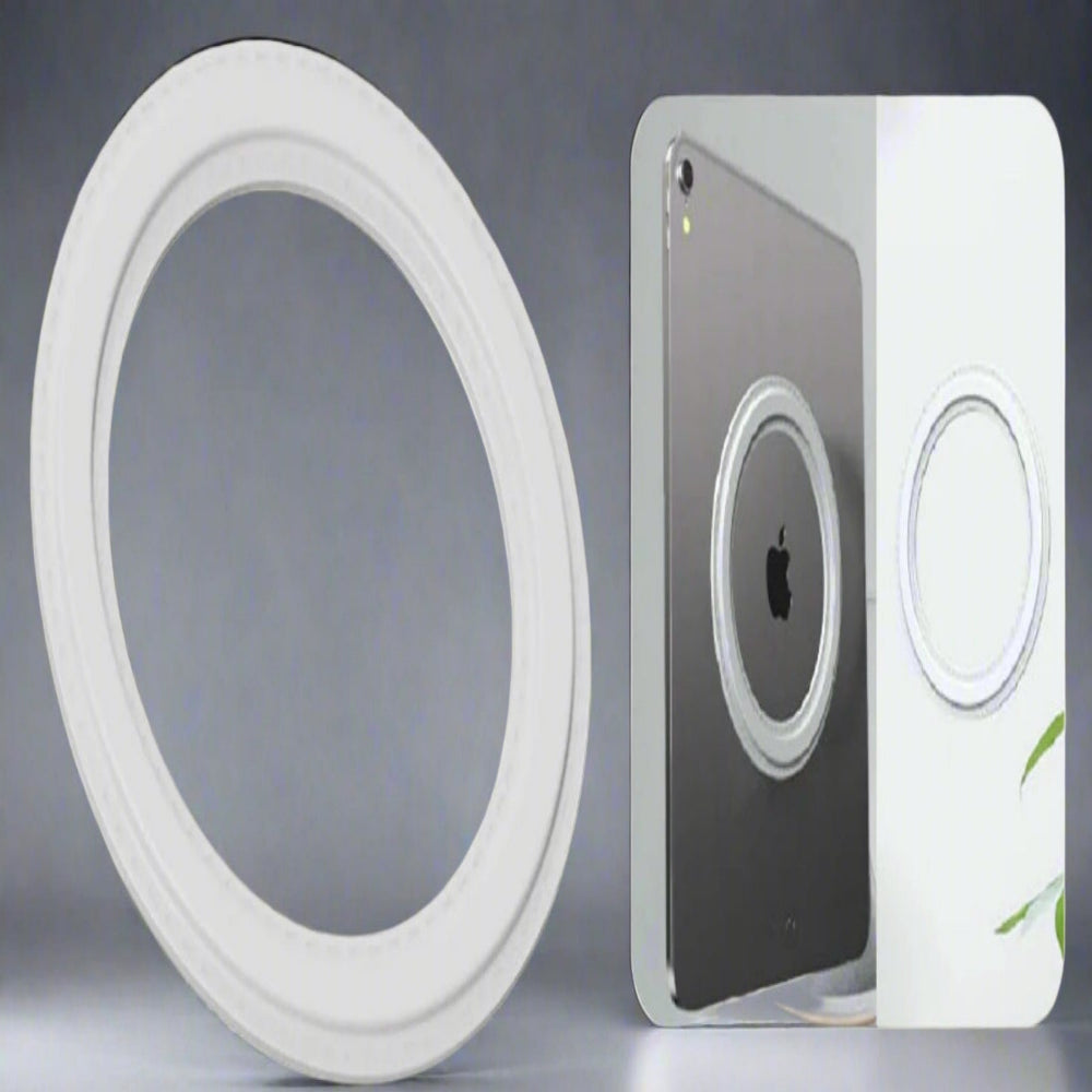 Two circular silicone rings with measurements and an Apple device in the background.