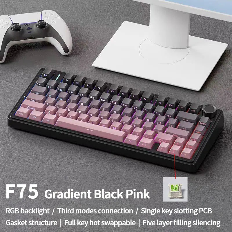 Gradient black pink keyboard on a desk with gaming accessories