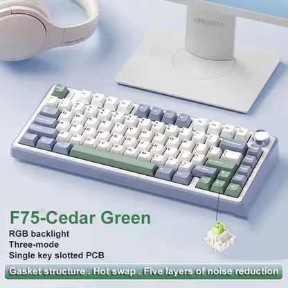 Mechanical keyboard with RGB backlight on a light blue surface, featuring the brand 'HUEDA'.